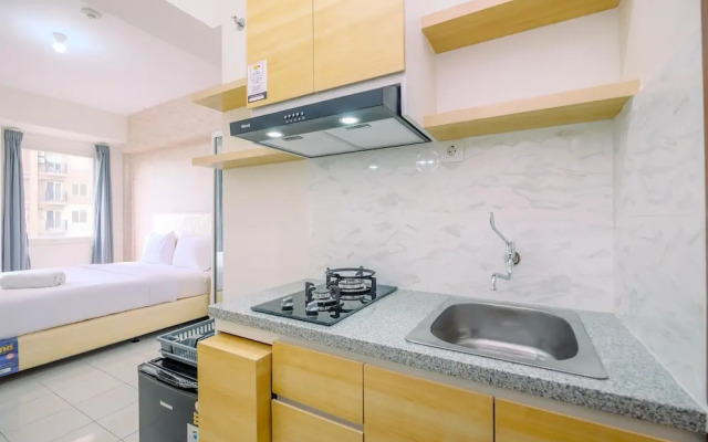 Nice and Warm Studio at Podomoro Golf View Apartment