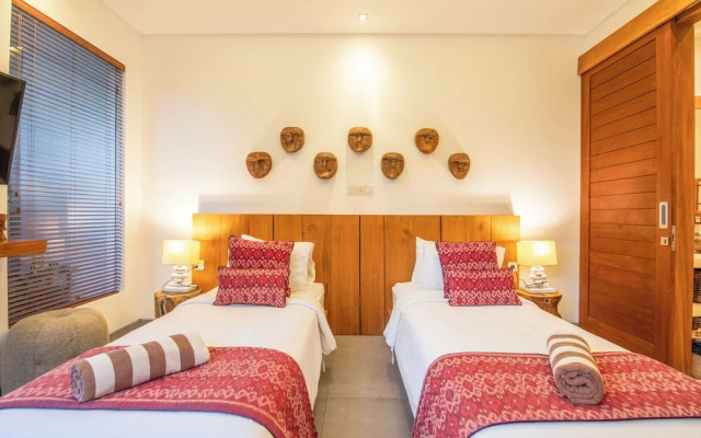 Luxury 4BR Haven, Steps to Canggu's Beach Elegance