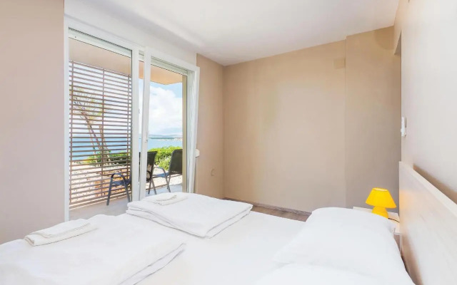 Two-Bedroom Apartment in Povljana