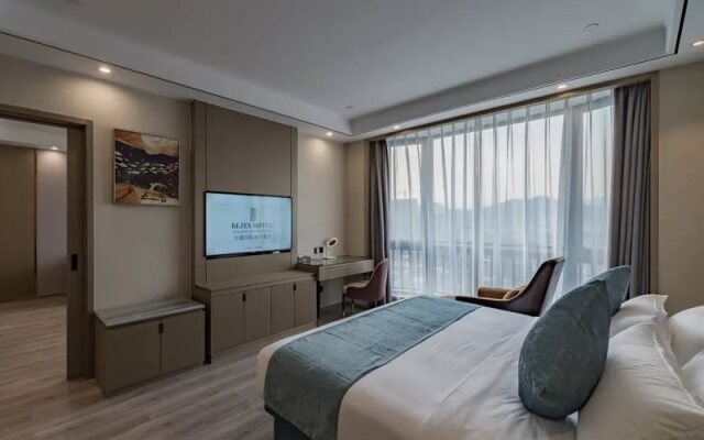 Rezen Hotel Wansheng International