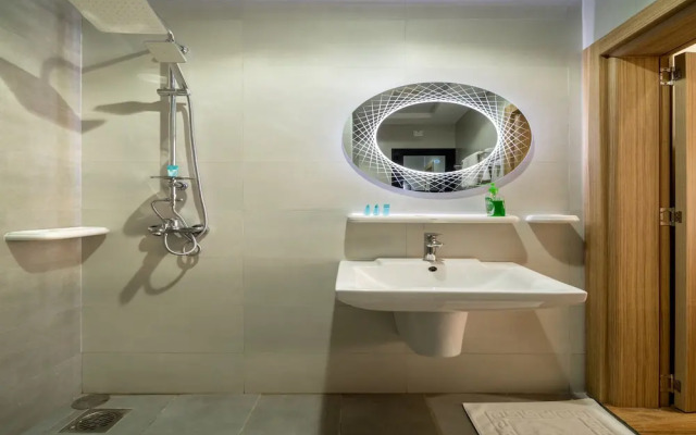 OYO Townhouse 156 Rose Hotel Apartments.
