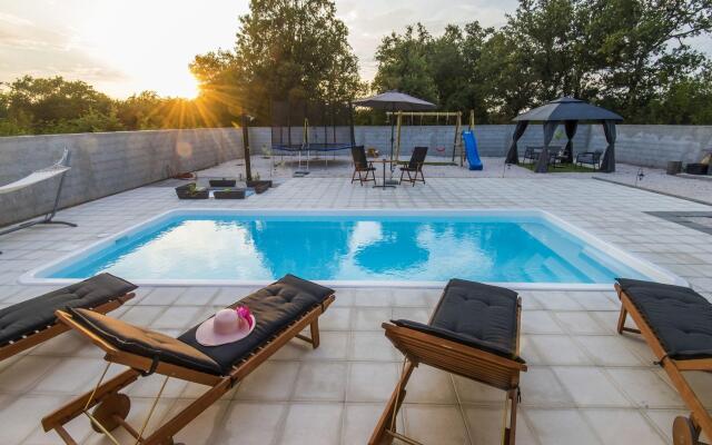 Beautiful villa with private swimming pool, nice covered terrace, play area, BBQ
