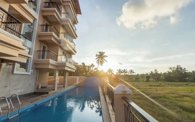 Palm Retreat 1BHK Pool & Field Views