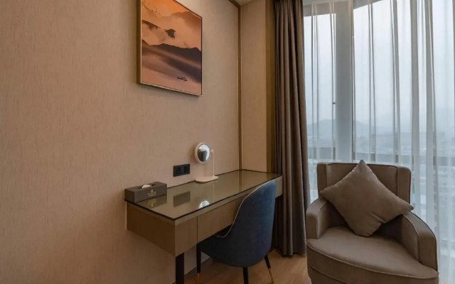 Rezen Hotel Wansheng International