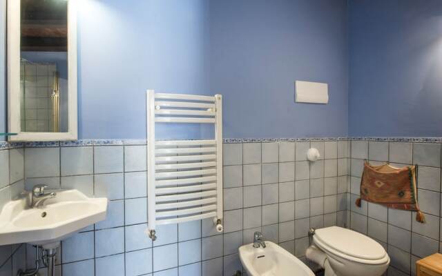 Terrazza e stile sui tetti della Kalsa