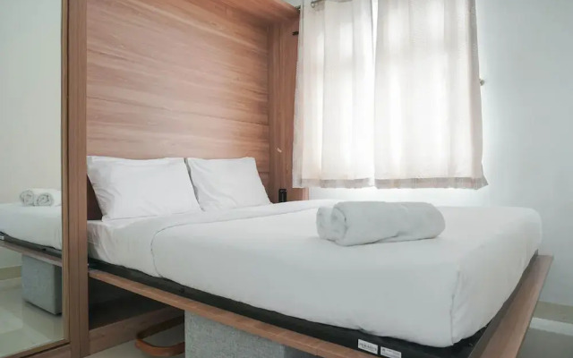 Restful and Tidy 2BR at Green Pramuka City Apartment