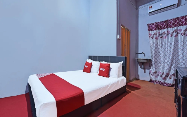 OYO 90664 Rabi Hotel