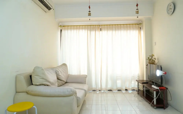 Clean and Homey 1BR at Puri Garden Apartment