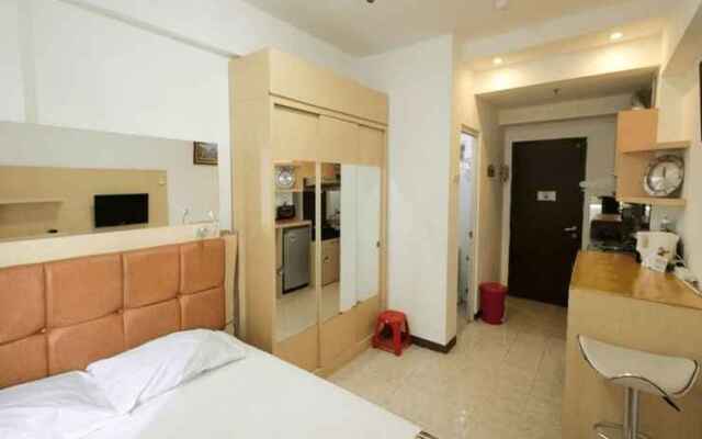 Apartment the Suites Metro by Edy Property