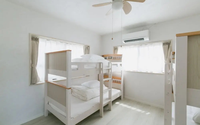 Sea Sunset Villa – Guest Rooms – Motobu