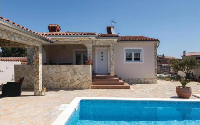 Three-Bedroom Holiday home Betiga with a Fireplace 02