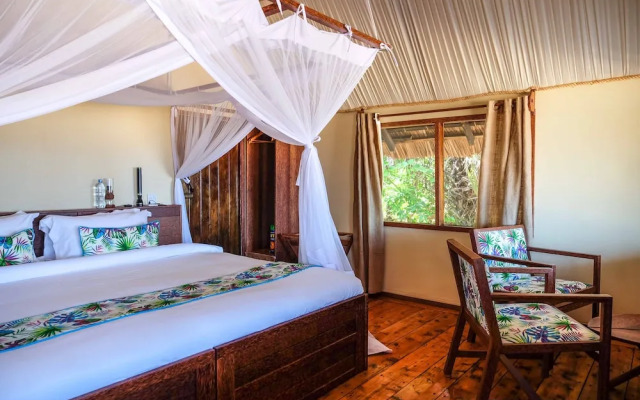 Saadani Safari Lodge - bush, river, beach