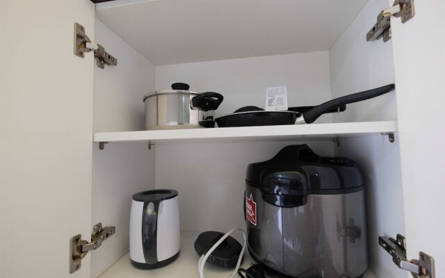 Homey and Relaxing 2BR Green Pramuka Apartment