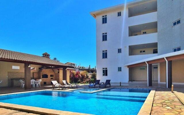 2 QUARTOS em CONDOMÍNIO TRANQUILO com PISCINA Estacionamento coberto  PARQUINHO para CRIANCAS - Cozinha Completa, VENTILADO, nascente, AR CONDICIONADO  800m da praia do PORTO DAS DUNAS e BEACH PARQUE - Ceará