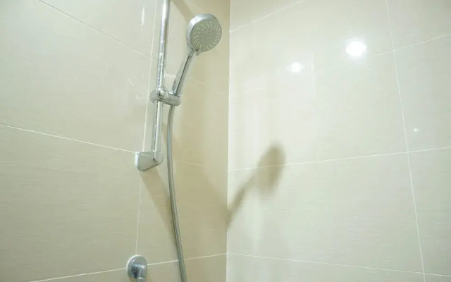 Strategic Location 1BR Apartment @ Puri Mansion near Puri By Travelio