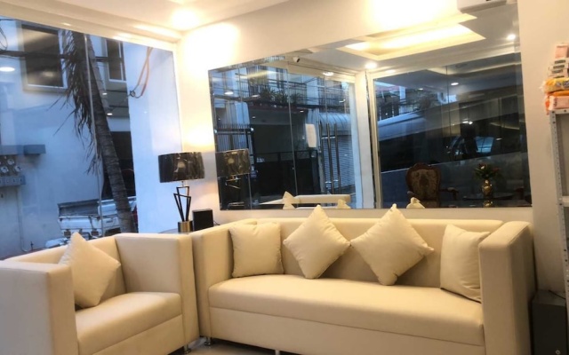 OYO 1128 W Sangco Building Leasing
