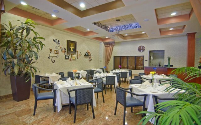 Marco LaGuardia Hotel & Suites