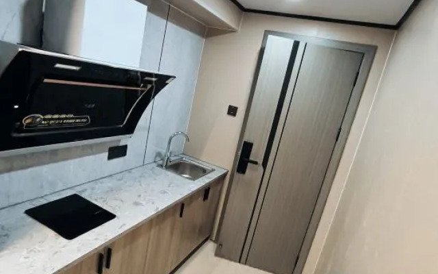 Hengdian Chunai Smart Apartment (Mingqing Gongyuan Branch)