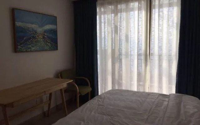 Fuxian Lake Yijing Homestay (Chengjiang Sunshan Town Square)