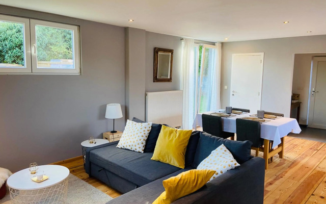 Jolie maison avec jardin.