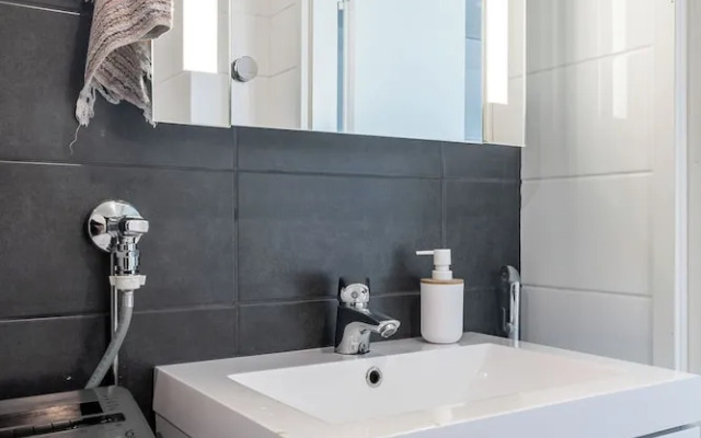 Modern 1BR Home with Sauna & Balcony