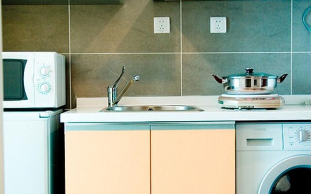 Dalian Yike Yijia Serviced Aparthotel