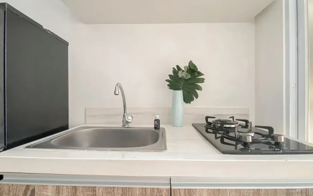 Minimalist 1Br At Vittoria Residence Apartment