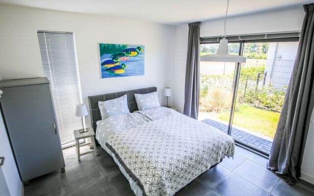 Magnificent waterfront design villa, located near Harderbos