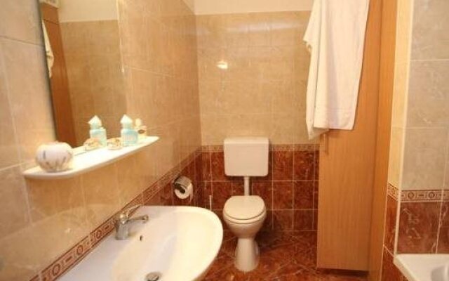 Lelle Park Apartmanház