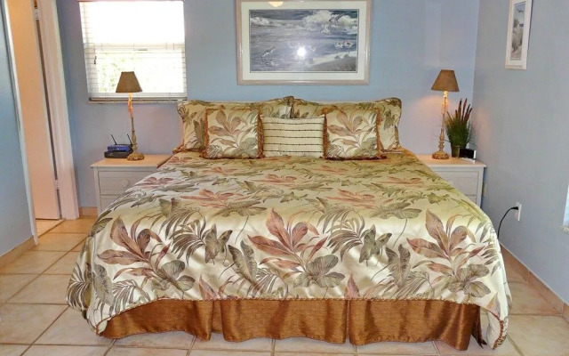 Cozy Home With Sunroom, Pool and Steps to Beach