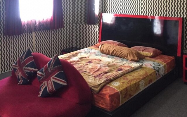 The Suites Metro Ananda Home