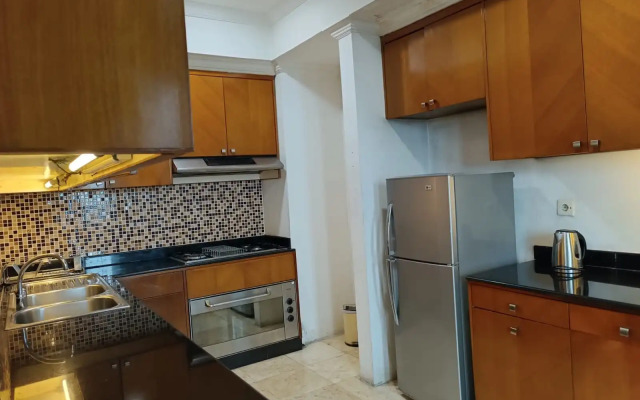Grand Tropic Suites Hotel