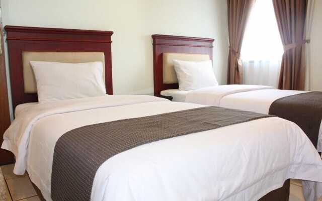 Travellers Suites Serviced Apartments