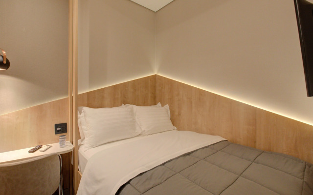 Fast Sleep Suites by Slaviero Hotéis dentro do Aeroporto Guarulhos Terminal 2, desembarque Oeste