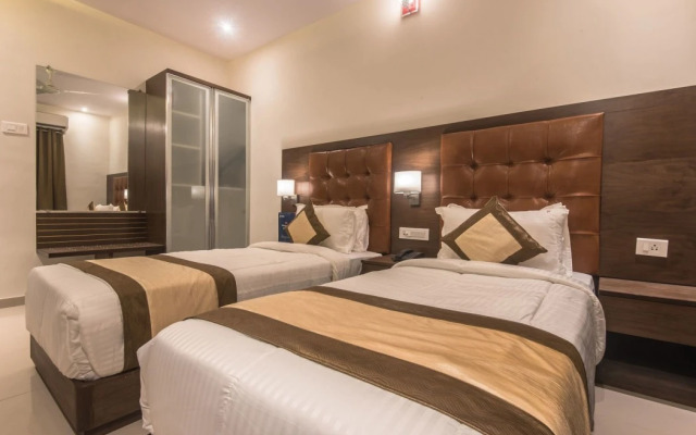 FabHotel Empire Suites