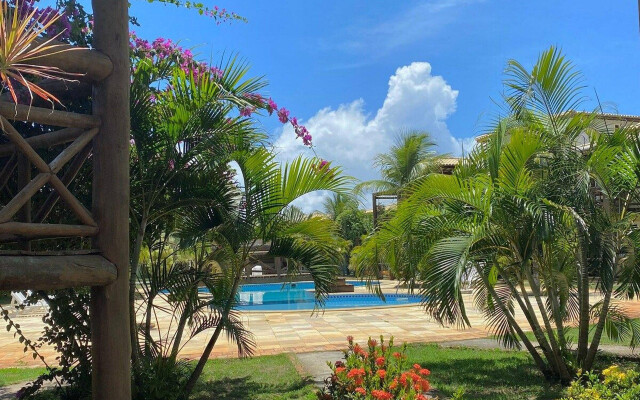 Villages pé na areia em Itacimirim