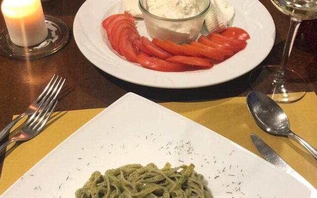 Al Fogolar Rooms & Osteria