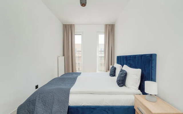Wroclaw Dark Blue Apartment by Renters