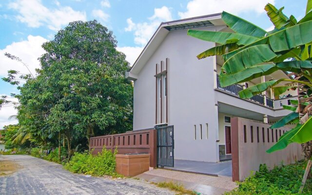 SPOT ON 92570 Putri Guest House Syariah Near SPBU Rimbo Panjang