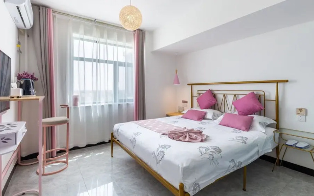 Floral Hotel Jiu Qi Yin Ju Dunhuang