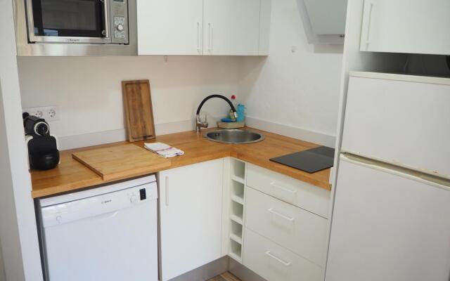 Apartament amb piscina i parquing.Baixos amb jardí