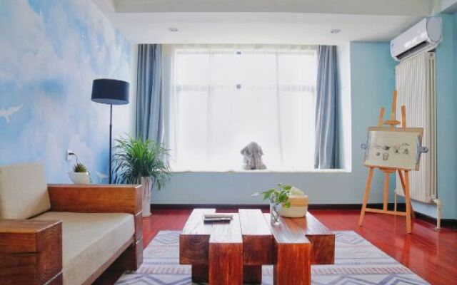 Quzhu City Homestay (Shiyan Wanda Plaza Branch)