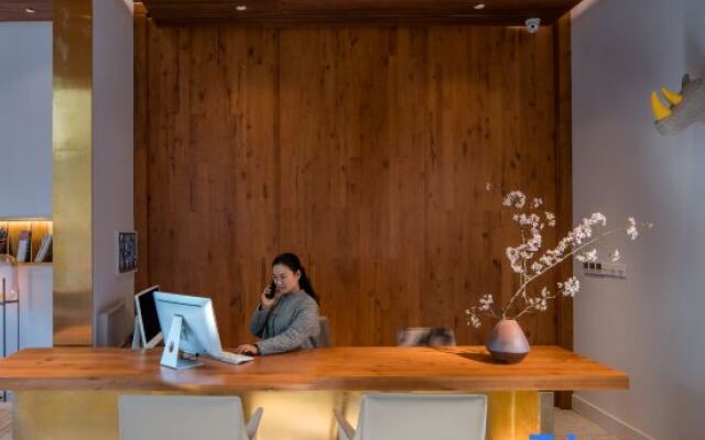 WuYu Hotel (Chongqing Yangjiaping Vientiane City)