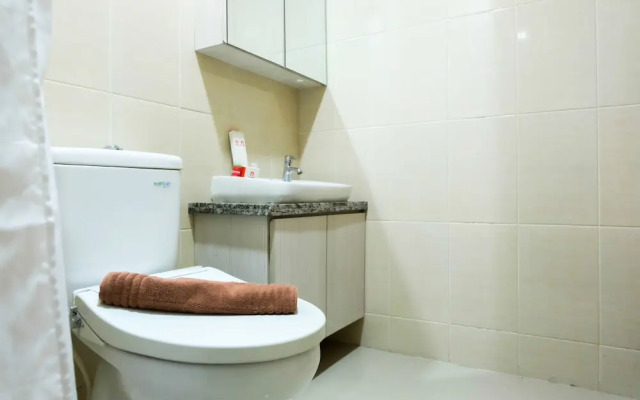 Comfortable Premiere 1BR at The Oasis Apartment