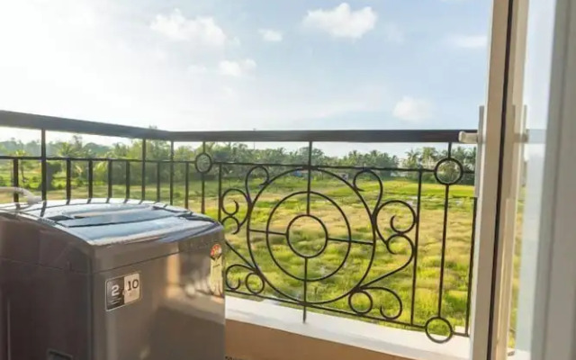 Palm Retreat 1BHK Pool & Field Views