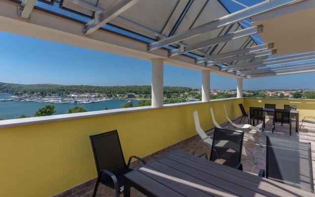 Awesome Apartment in Pomer With 2 Bedrooms
