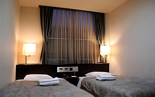 Kochi Business Hotel Bekkan – Guest Rooms – Kochi