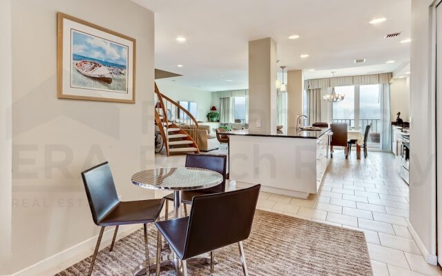 Spacious Oceanfront Penthouse Villa by RedAwning