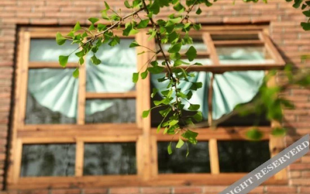 Xiandu Songge Xianrenju Hostel