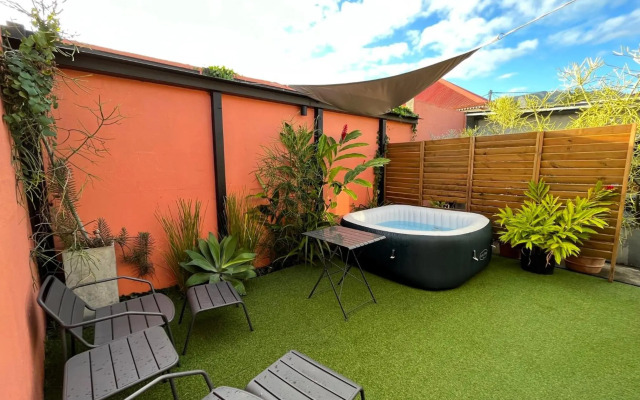 Charmant bungalow climatisé avec jacuzzi